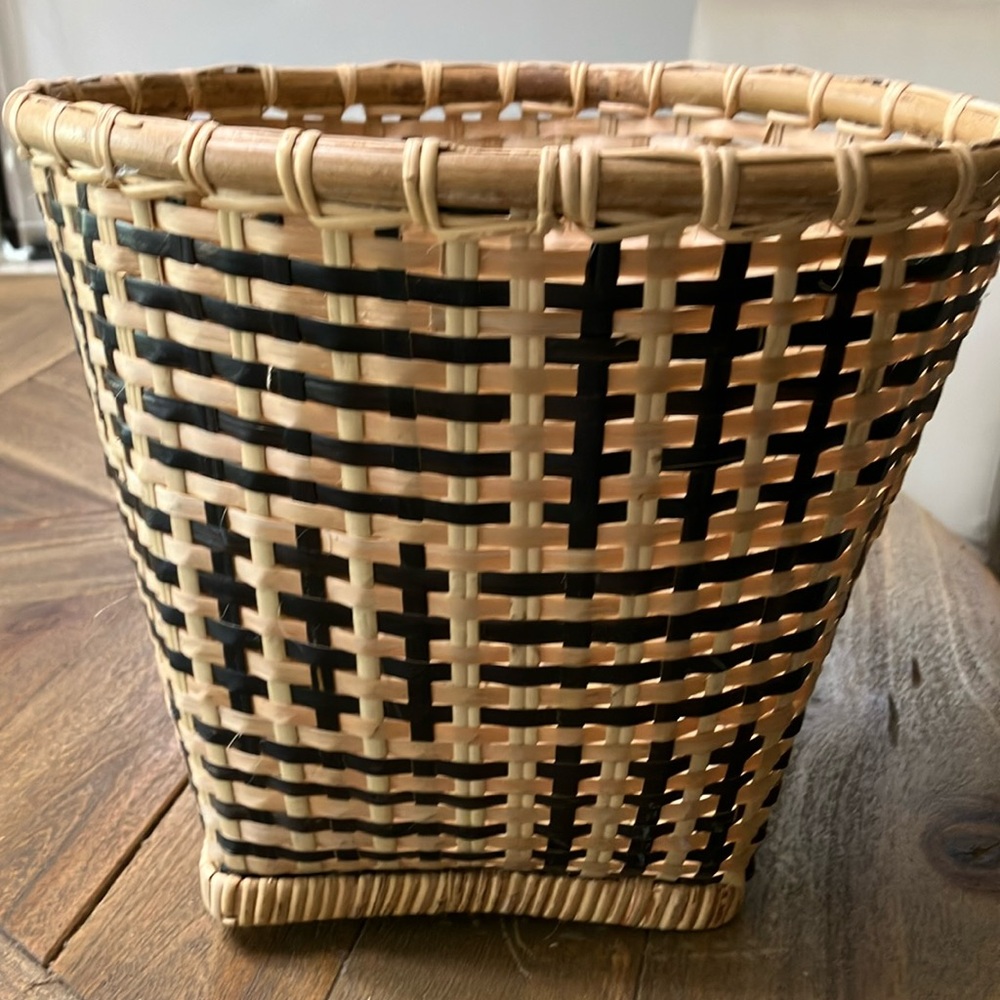 Hand weaved basket for bicycle or home. Two small straps for easy hookup.